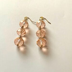 Faceted rose colored glass dangle earrings